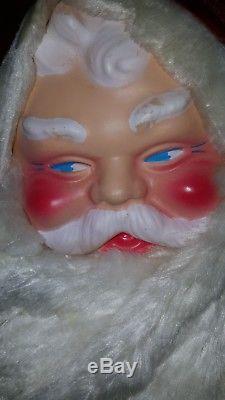 large stuffed santa doll