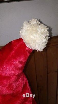 large stuffed santa doll