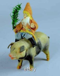 1900 Antique Belsnickle Santa Claus Riding a Tail-Cranking Musical Spot Pig