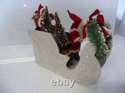 2 Vintage Santas in Vintage Sleigh with Trees and Xmas Wreath