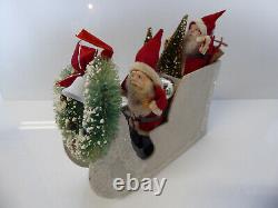 2 Vintage Santas in Vintage Sleigh with Trees and Xmas Wreath