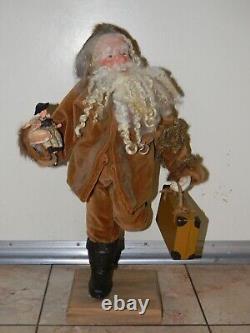 90 One-of-a-kind Santa Figure Running with Doll & Suitcase by LOIS CLARKSON