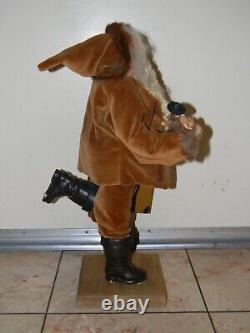 90 One-of-a-kind Santa Figure Running with Doll & Suitcase by LOIS CLARKSON