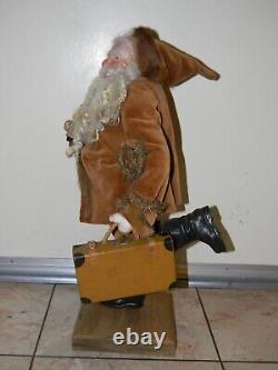 90 One-of-a-kind Santa Figure Running with Doll & Suitcase by LOIS CLARKSON