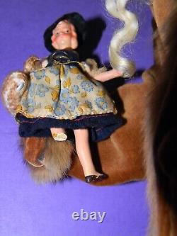 90 One-of-a-kind Santa Figure Running with Doll & Suitcase by LOIS CLARKSON