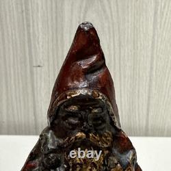ANTIOUE CAST IRON SANTA CLAUS DOOR STOP FIGURE DATED 1890 5 1/2 Paper weight