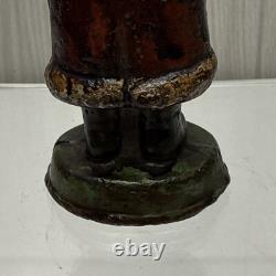 ANTIOUE CAST IRON SANTA CLAUS DOOR STOP FIGURE DATED 1890 5 1/2 Paper weight