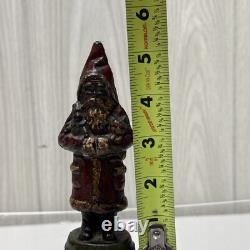 ANTIOUE CAST IRON SANTA CLAUS DOOR STOP FIGURE DATED 1890 5 1/2 Paper weight