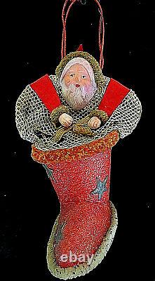 ANTIQUE Celluloid Santa Claus in Boot Net Christmas Candy Holder Container. RARE