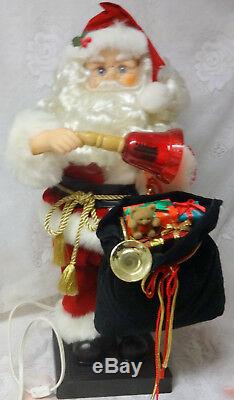 Animated Musical Telco Motion Lighted Bell Santa Claus w Toy Bag Christmas