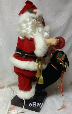 Animated Musical Telco Motion Lighted Bell Santa Claus w Toy Bag Christmas