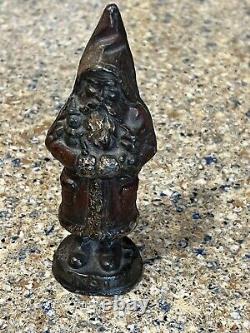 Antioue Cast Iron Santa Claus Door Stop Figure Dated 1890 5 1/2 High