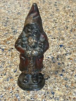 Antioue Cast Iron Santa Claus Door Stop Figure Dated 1890 5 1/2 High