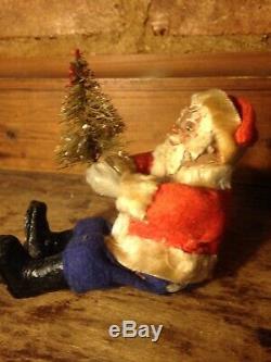 Antique German SANTA CLAUS Sitting With Tree. Olive Skinned