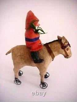 Antique German Santa Claus Riding Donkey on Wheels Cute