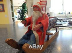Antique German Santa Claus and Wooden Sled with Vintage Toys