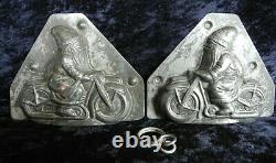 Antique vintage old metal iron chocolate mold figure Santa Claus on motorcycle