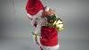 Bald Santa Claus Toy Figure Twirling And Playing With Santa Claus Hat