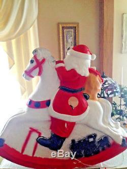 535175 Poly-Santa on Rocking Horse Colourful 29 x 11 x 34cm Santa Santa Claus 