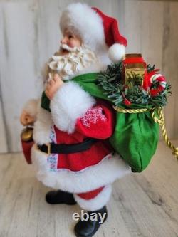 Clothique possible dreams running late clock RARE Xmas Santa Claus figure