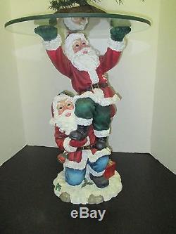 Collectable 2 Santa Claus Christmas Statue Holding a Clear Glass Table Top