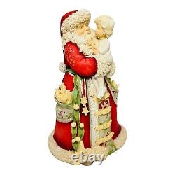 Enesco The Heart of Christmas Santa Claus With Child Figure 4034453 9