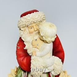 Enesco The Heart of Christmas Santa Claus With Child Figure 4034453 9