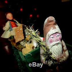 German Santa Claus with Feather Tree, Riding a Green Loofah Airplane with Toys