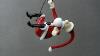 Glass Figure Representing Santa Claus Hanging From A Rope
