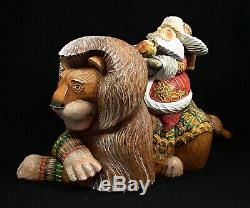 Hand Carved & Painted Santa Riding LION