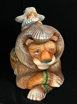 Hand Carved & Painted Santa Riding LION