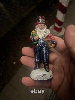 Heavy Santa Claus patriotic uncle Sam figurine/paperweight 1912