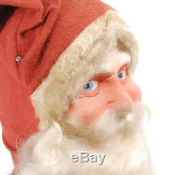 Large vintage straw stuffed Santa Claus with painted cloth face