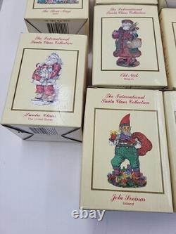 Lot of 11 International Santa Claus International Christmas Figurines