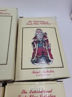 Lot of 11 International Santa Claus International Christmas Figurines