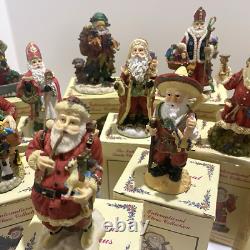 Lot of 13 Santa Figurines From The International Santa Collection Christmas