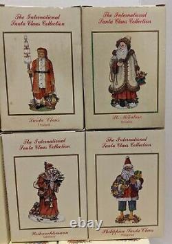 Lot of 14 International Santa Clause Collection Figures Figurines