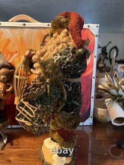 Old World Woodland style Santa Claus figurines