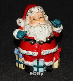 Santa Claus Christmas Figure Vintage Bell String Sittihg On Gifts Bank 1960s