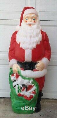 Santa Claus and his bag of Toys & Gifts 4 feet tall Blow Mold Yard Ornament