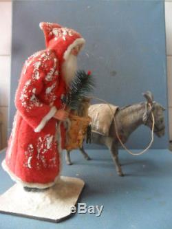 Santa claus german papermache with feather tree and donkey old