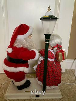 Telco Mommy Kissing Santa Claus Animated Musical #524565 Christmas Motionettes
