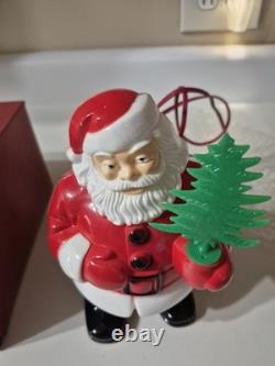 This is a vintage light-up Santa Claus blow mold figure. 1953