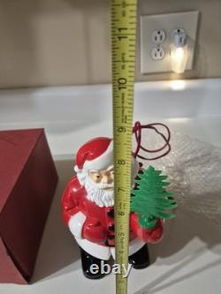 This is a vintage light-up Santa Claus blow mold figure. 1953