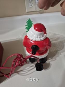 This is a vintage light-up Santa Claus blow mold figure. 1953
