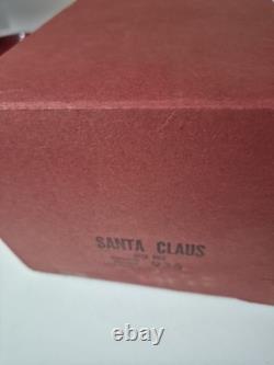 This is a vintage light-up Santa Claus blow mold figure. 1953