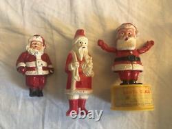 Three Vintage Celluloid Hand Puppet Lead Figure Toys of Santa Claus Christmas