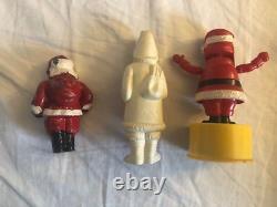 Three Vintage Celluloid Hand Puppet Lead Figure Toys of Santa Claus Christmas