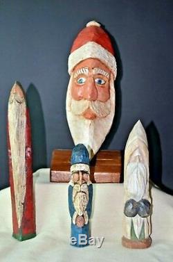 VTG LOT OF 4 HAND CARVED PAINTED SANTA CLAUS FIGURES CARVINGS art folk antique