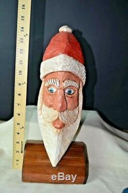 VTG LOT OF 4 HAND CARVED PAINTED SANTA CLAUS FIGURES CARVINGS art folk antique